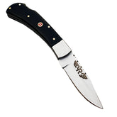 Ruddock Bros folding knife with black plastic resin handle with stainless steel blade with leather sheath Ruddock El Paso Texas
