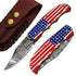 Ruddock Bros folding knife with plastic resin handle in American Flag pattern and Damascus steel blade with leather sheath Ruddock El Paso Texas