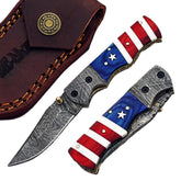 Ruddock Bros folding knife with natural bone and wood handle with Damascus steel blade with leather sheath Ruddock El Paso Texas