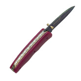 Ruddock Bros Damascus steel folding knife with acid wash blade  and sangria purple handle Ruddock El Paso Texas