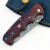 Damascus Steel Folding Knife – Ergonomic Grip & Strong Build