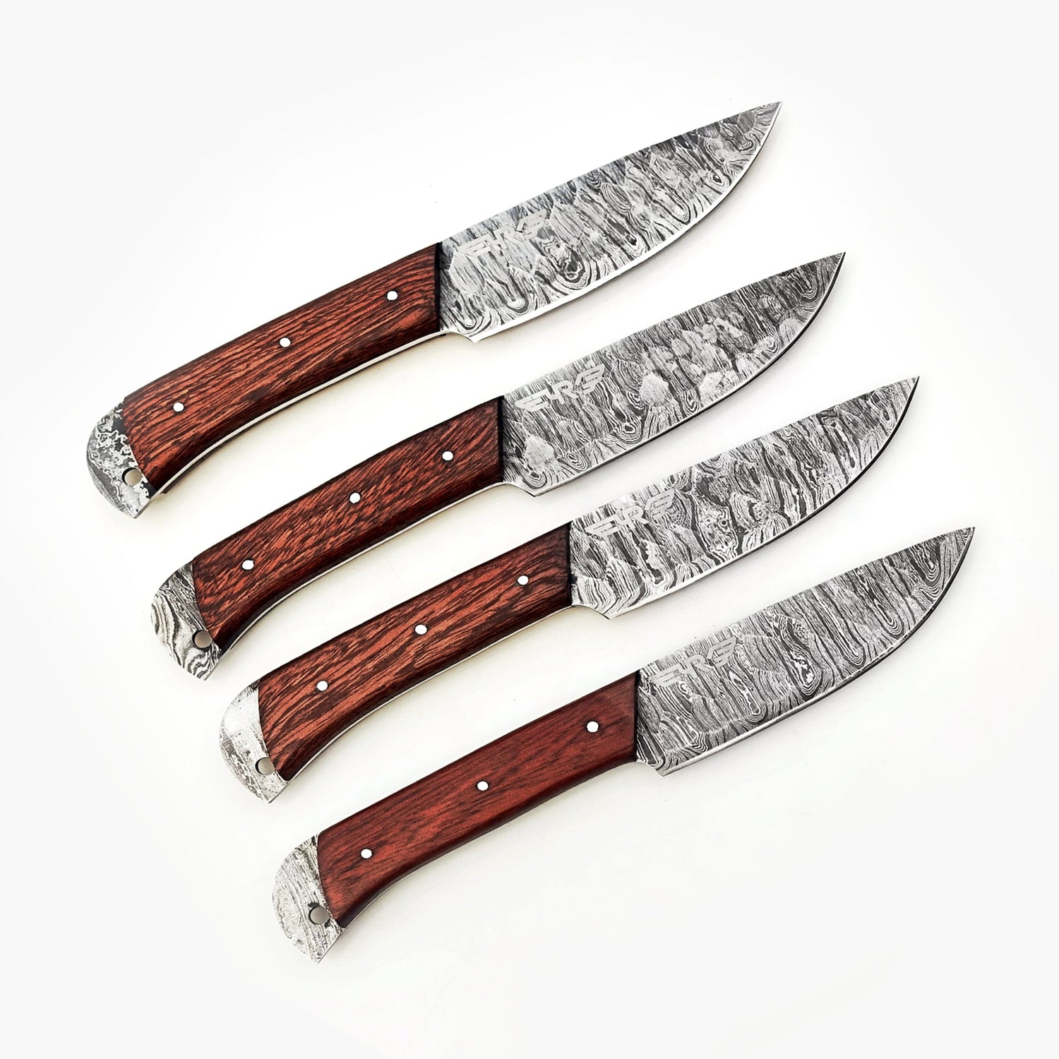 Ruddock Bros 4 piece steak knife set with natural brown hardwood handle and Damascus steel blade Ruddock El Paso Texas