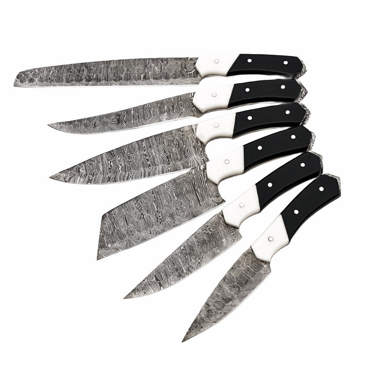 Damascus Steel 6 piece knife set with black and white resin handle with leather carry pouch by Ruddock Bros El Paso Texas USA Ruddock Shirt