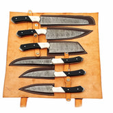 Damascus Steel 6 piece knife set with black and white resin handle with leather carry pouch by Ruddock Bros El Paso Texas USA Ruddock Shirt with leather carry case