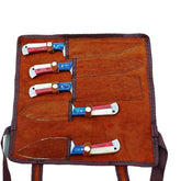 Ruddock Bros five piece grilling knife set with hammered stainless steel blades with natural bone and hardwood handles in red white and blue includes suede leather carry pouch Ruddock El Paso Texas