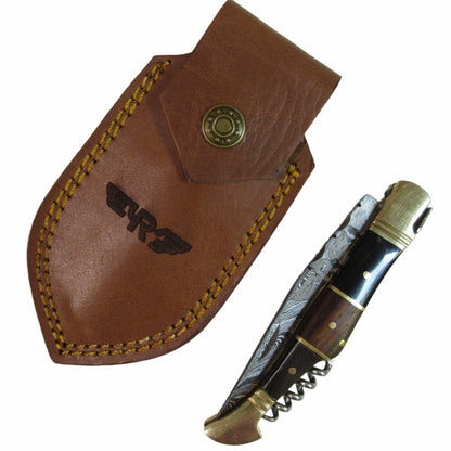 pocket knife by Ruddock Bros with hardwood handle and corkscrew Damascus steel El Paso Texas