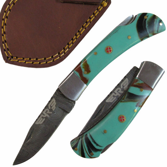 turquoise colored resin handle folding knife with Damascus steel blade  by Ruddock Bros El Paso Texas