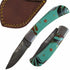turquoise colored resin handle folding knife with Damascus steel blade  by Ruddock Bros El Paso Texas