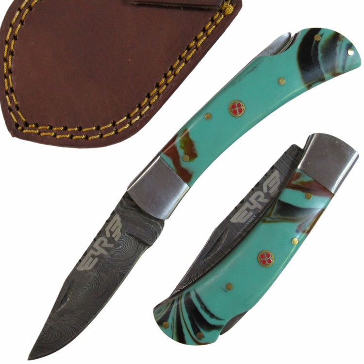 turquoise colored resin handle folding knife with Damascus steel blade  by Ruddock Bros El Paso Texas
