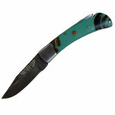turquoise colored resin handle folding knife with Damascus steel blade  by Ruddock Bros El Paso Texas