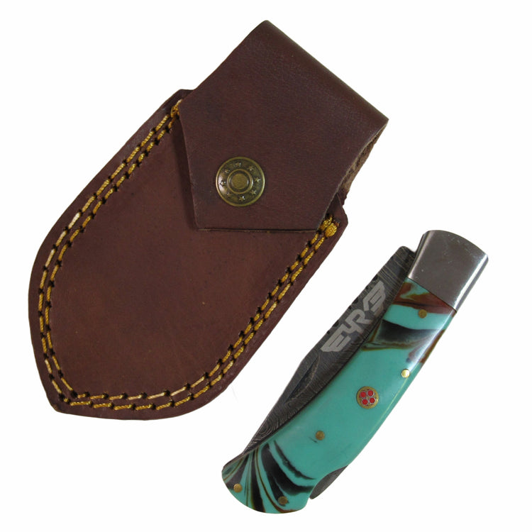 turquoise colored resin handle folding knife with Damascus steel blade  by Ruddock Bros El Paso Texas